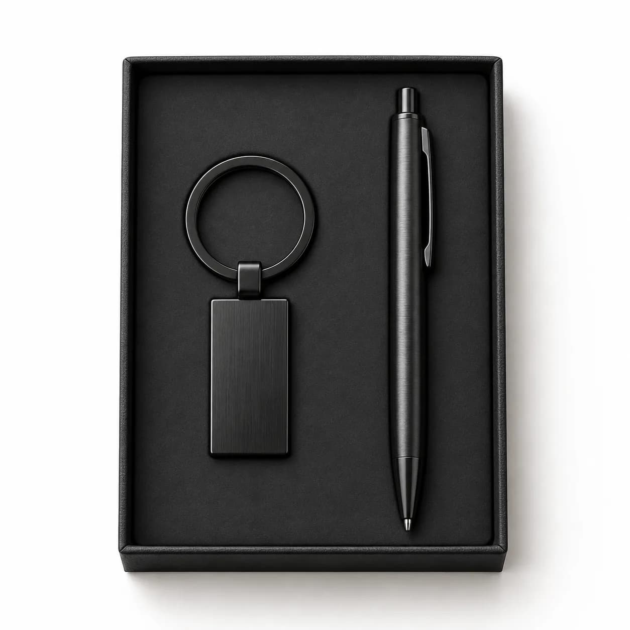 Set teamsleutelhanger en pen